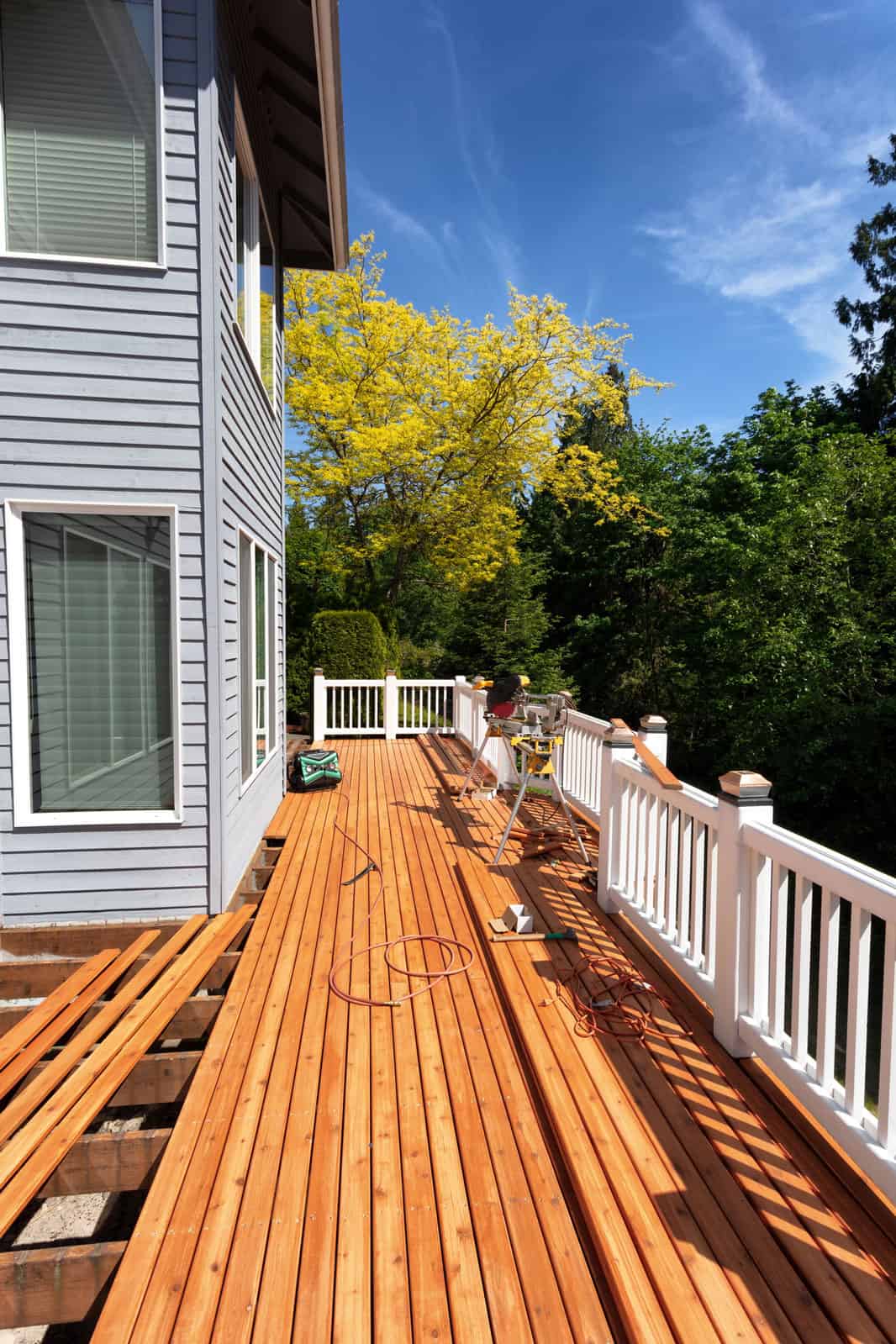 Outdoor-wooden-deck-being-completely-remodeled-during-springtime Pressure Washing Shelby County M